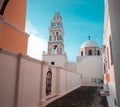 Sunny morning view of Santorini island. Picturesque spring scene of the Catholic Cathedral Church of Saint John The Baptistm in Royalty Free Stock Photo