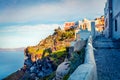 Sunny morning view of Santorini island. Picturesque spring scene of the famous Greek resort Fira, Greece, Europe. Royalty Free Stock Photo