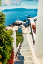 Sunny morning view of Santorini island. Picturesque spring scene of famous Greek resort Fira, Greece, Europe. Traveling concept Royalty Free Stock Photo