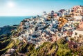 Sunny morning view of Santorini island. Picturesque spring scene of the famous Greek resort Oia, Greece, Europe. Traveling concept Royalty Free Stock Photo