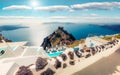 Sunny morning view of Santorini island. Picturesque spring scene of the famous Greek resort Thira, Greece, Europe. Traveling conce Royalty Free Stock Photo