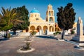 Sunny morning view of Santorini island. Picturesque spring scene of the Saint George Church, Oia, Greece, Europe.