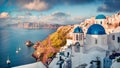 Sunny morning view of Santorini island. Picturesque spring sunrise on the famous Greek resort Oia, Greece, Europe.