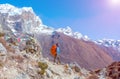 Sunny Mountain View and Nepalese Mountain Guide staying on Footpath