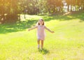 Sunny photo happy little child enjoying summer day Royalty Free Stock Photo