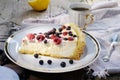 Sunny Photo with a morning breakfast in rustic style. Cheesecake raspberries and blueberries on wooden table.