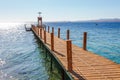 Sunny pier at the coast of Red Sea in Sharm el Sheikh, Sinai, Egypt, Asia in summer hot. ÃÂ¡oral reef and crystal clear water. Royalty Free Stock Photo