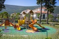 Sunny Playtime: Colorful Children& x27;s Playground in Portonovi Royalty Free Stock Photo