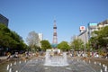 A sunny plaza with a water fountain near Sapporo TV tower