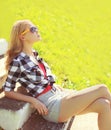 Sunny portrait of stylish hipster pretty woman in sunglasses Royalty Free Stock Photo