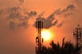 Sunny red sunset in Quiet evening time, Tower, trees and clouds. in india, chennai