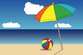 Sunny sandy beach umbrella and a boll over sea