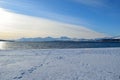 Sunny sea and snowy mountain Royalty Free Stock Photo