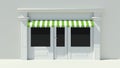 Sunny Shopfront with large windows White store facade with green and white awnings