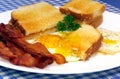 Sunny Side Eggs, Bacon and Toast Royalty Free Stock Photo