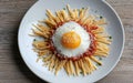 Sunny side up egg on spaghetti with tomato sauce Royalty Free Stock Photo
