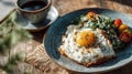Sunny Side Up Egg with Spinach and Tomatoes Breakfast Royalty Free Stock Photo