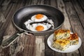 Sunny Side Up Fried Eggs In Old Frying Pan With Plateful Of Cheese And Spinach Pie Zeljanica Slices Set On Old Garden Table Royalty Free Stock Photo
