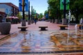 Dancing Waters on the Pearl St. Mall for people of all ages to enjoy. Bright sunny day in spring.