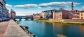 Sunny spring cityscape of Florence with Old Palace Palazzo Vecchio or Palazzo della Signoria on background and Ponte Vecchio Royalty Free Stock Photo