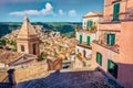 Sunny spring cityscape of Ragusa town with Church of St Mary
