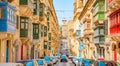 Valletta street with colorful balconies Royalty Free Stock Photo