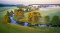 Sunny summer calm morning panorama. Small river, fog sunrise aerial view