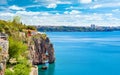 Rocky shore, blue sky and clear sea in Antalya, Turkey Royalty Free Stock Photo