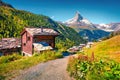 Sunny summer morning in Zermatt village with Matterhorn Monte C Royalty Free Stock Photo