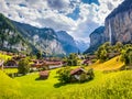 Sunny summer view of great waterfall in Lauterbrunnen village. Splendid outdoor scene in Swiss Alps, Bernese Oberland in the