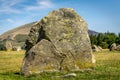 Ancient stone circle at castlerigg, with a mountain.