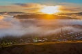 Sunny sunrise over the Ural mountains over the village of Inzer Royalty Free Stock Photo