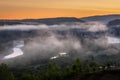 Sunny sunrise over the Ural mountains over the village of Inzer Royalty Free Stock Photo