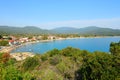 A sunny sunrise view of Olympiada Village with its gulf, Chalkidiki, Greece