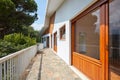 Sunny terrace and large window in country house Royalty Free Stock Photo