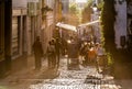 Sunny terraces in a narrow street of the Marolles, Brussels, Belgium