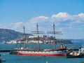 Sunny view of the Alcatraz Island and San Francisco Bay with a vessel ship