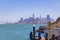 Sunny view of the Alcatraz Island and San Francisco skyline Royalty Free Stock Photo