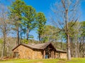 Sunny view of the Beavers Bend Nature Center in Beavers Bend State Park Royalty Free Stock Photo