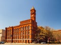 Sunny view of the clock tower of Sidney R. Yates Federal Building