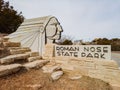 Sunny view of the entrance sign of Roman Nose State Park