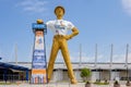 Sunny view of the Golden Driller Statue