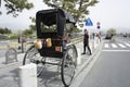 Sunny view of man pulled cart Royalty Free Stock Photo