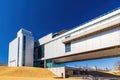 Sunny view of the modern William J. Clinton Library and Museum