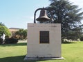 Sunny view of the Ponca City bronze bell of City Hall