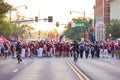 Sunny view of the student Marching Band walking in Homecoming parade Royalty Free Stock Photo