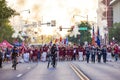 Sunny view of the student Marching Band walking in Homecoming parade Royalty Free Stock Photo