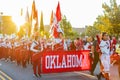 Sunny view of the student Marching Band walking in Homecoming parade Royalty Free Stock Photo