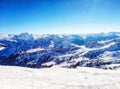 Sunny winter day in alpine ski resort, damÃÂ¼ls vorarlberg Austria Royalty Free Stock Photo