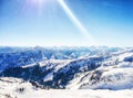 Sunny winter day in alpine ski resort, damÃÂ¼ls vorarlberg Austria Royalty Free Stock Photo